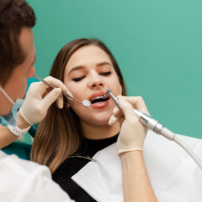 dentist performs professional polishing of tooth e 2022 02 02 05 43 40 utc.jpg