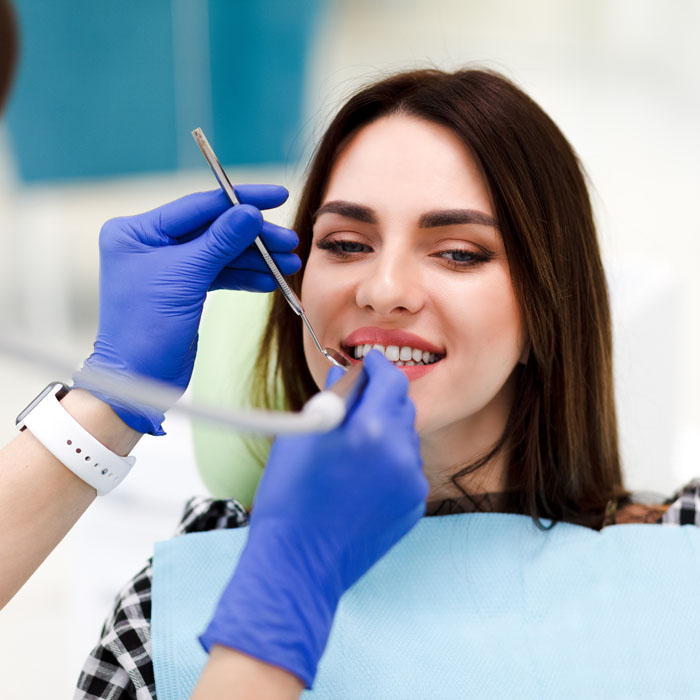 woman at the dentistry dentist treats teeth to his 2022 02 02 02 03 02 utc.jpg